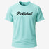 Light blue t-shirt with 'Pickleball' text on a white background